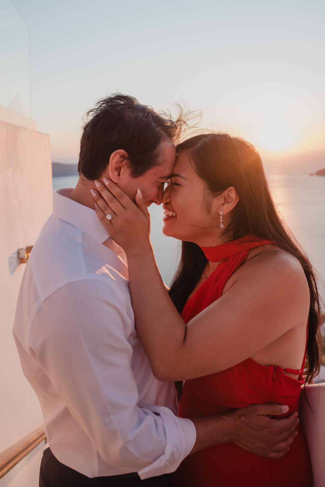 The words landing: a couple close together in golden light as the question is asked